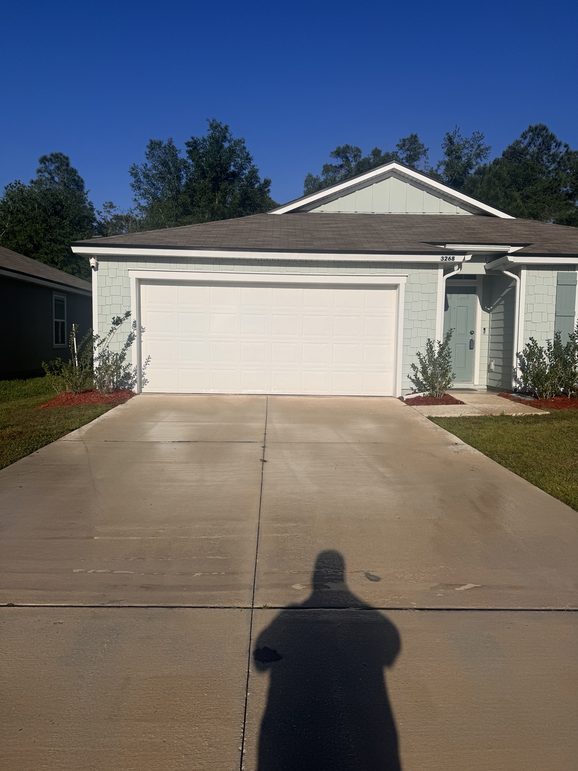 Clean residential driveway after pressure washing